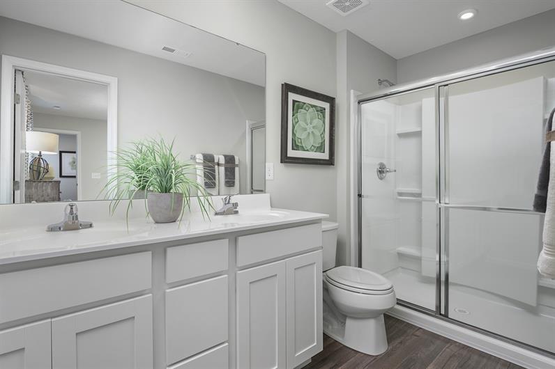 THERE’S AN ENSUITE BATH AND WALK-IN CLOSET INCLUDED IN YOUR OWNER’S SUITE 