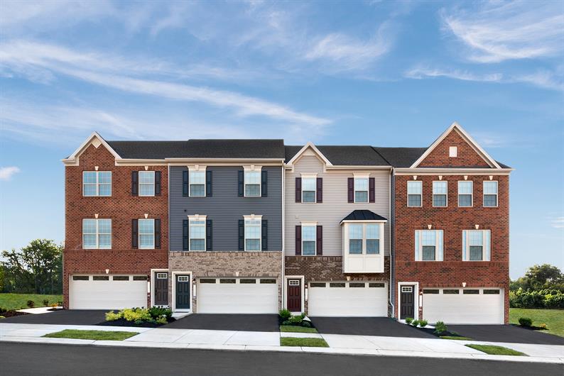 NEW GARAGE TOWNHOMES WITH BACKYARDS