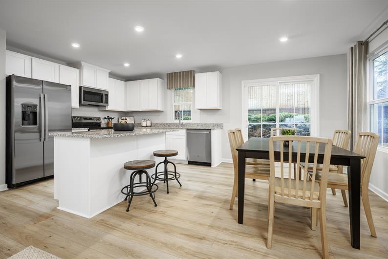 Open House: Sat. & Sun. 1-4 PM. TOUR NEW TOWNHOMES WITH A GARAGE