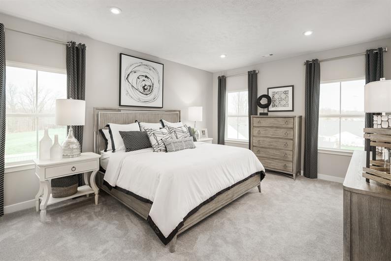 RELAX AND UNWIND IN A SPACIOUS SUITE WITH EN SUITE BATH AND WARDROBE-SIZED WALK-IN CLOSET 