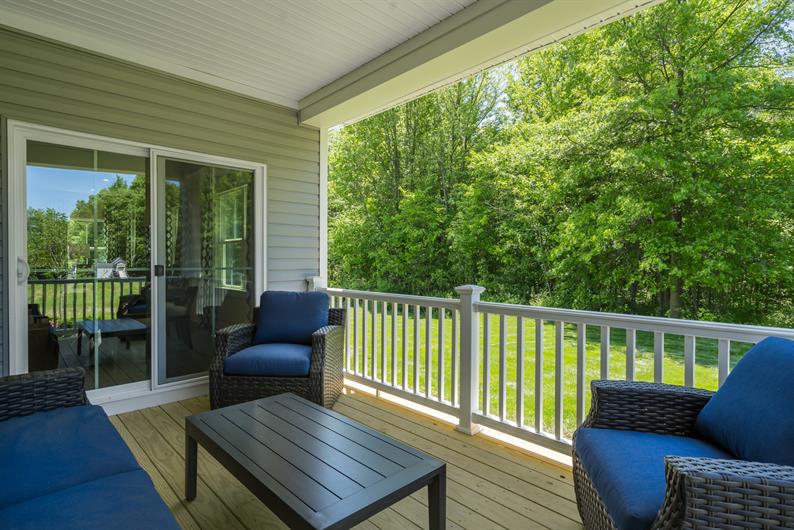 ENJOY THE SERENE WOODED VIEWS FROM YOUR SPACIOUS HOMESITE 