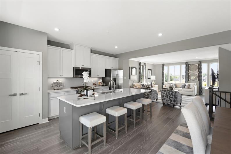 NEW TOWNHOMES WITH RESORT-STYLE AMENITIES AND WALKABILITY TO EVERYDAY CONVENIENCES 