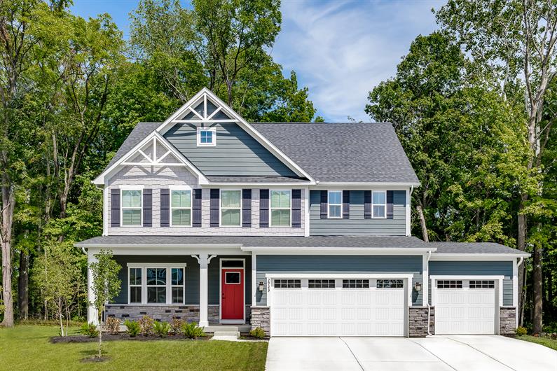 CURBSIDE APPEAL WITH INCLUDED 3-CAR GARAGES PER FLOORPLAN AND STONE AND BRICK DETAILED EXTERIORS 