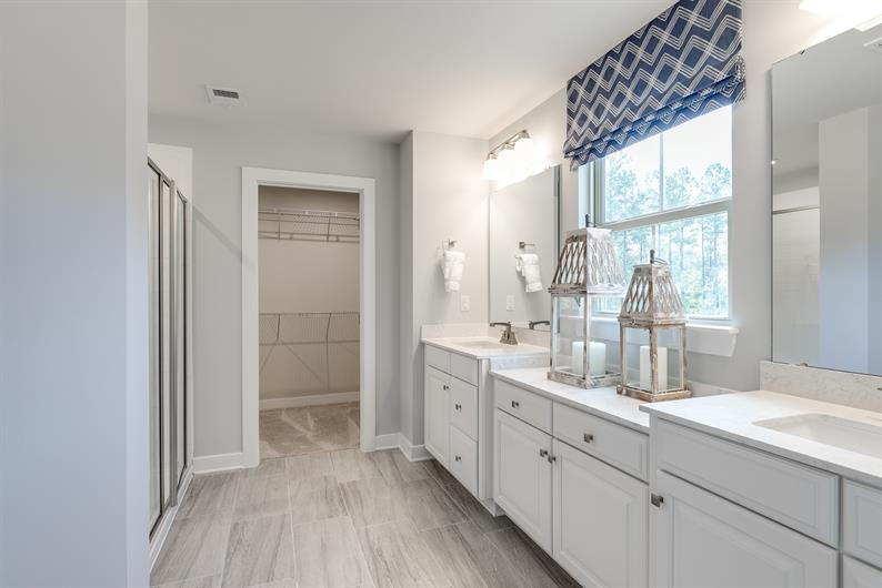 MORNING ROUTINES MADE EASY WITH DUAL VANITIES AND EXTRA STORAGE 
